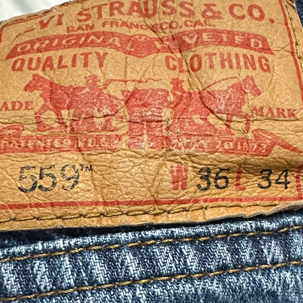 Levi's 559 Blue Jeans with Tan Leather Patch